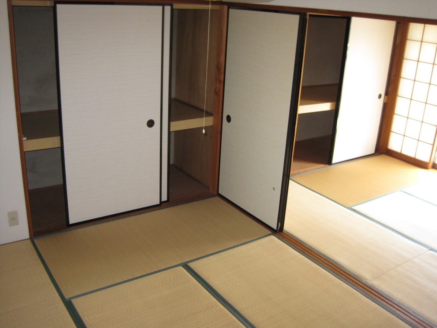 押入